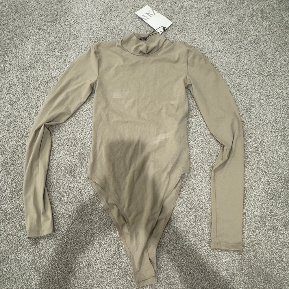 Never worn turtleneck bodysuit